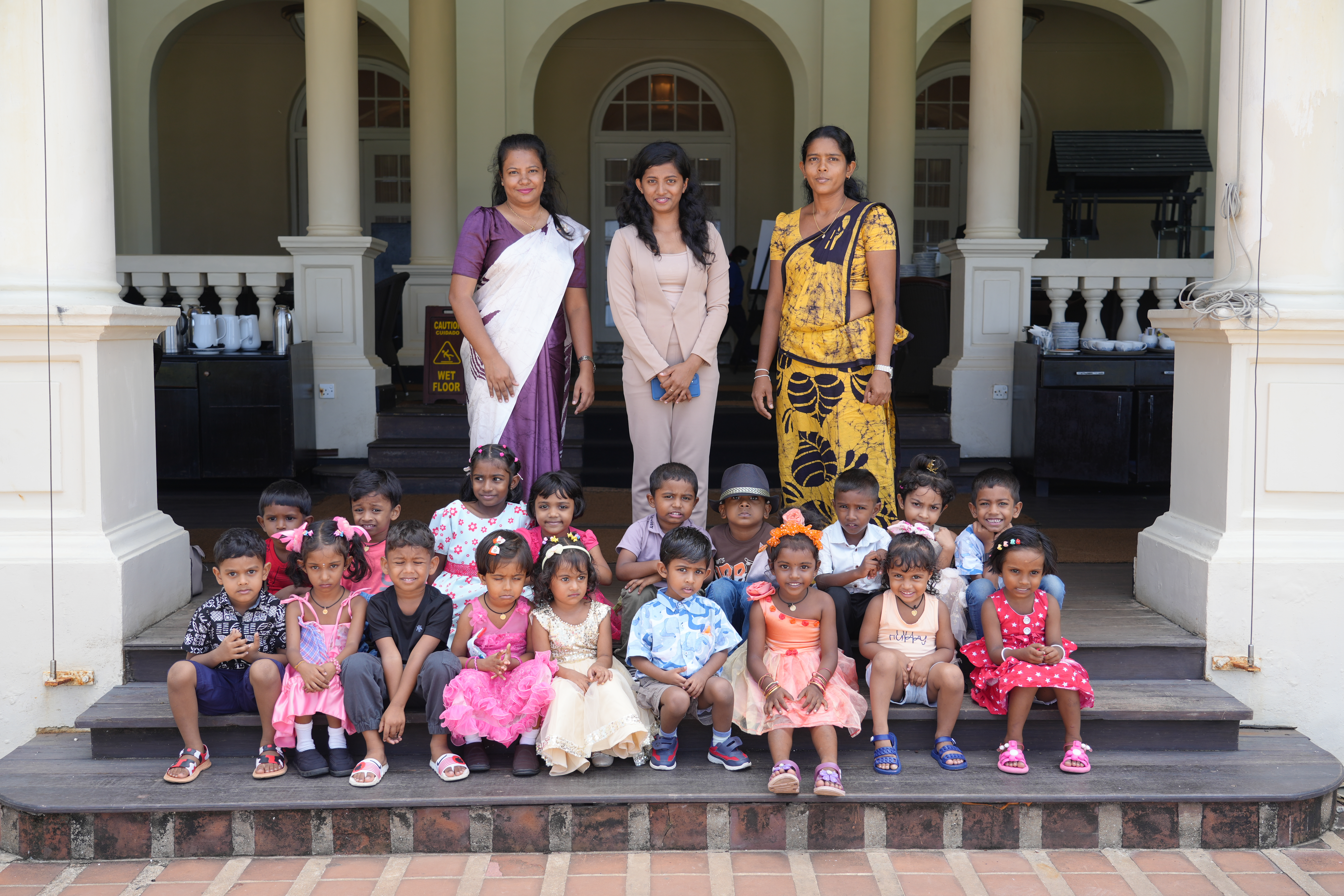Teacher reading a storybook to children